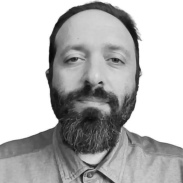 Elliott Cochran's professional headshot.