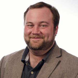 Charles Henson's professional headshot.